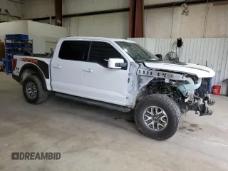 2023 Ford F-150 Raptor with VIN 1FTFW1RG5PFB97799, listed as a Copart auction lot 47471485 with 27,282 mi miles and Salvage Title. Bid and sale history available at DreamBid. Image 4.