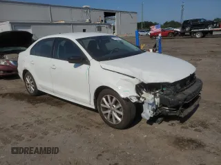 2015 Volkswagen Jetta SE with VIN 3VWD17AJ8FM343642, listed as a Copart auction lot 61975665 with 106,035 mi miles and Salvage title. Bid and sale history available at DreamBid. Image 4.