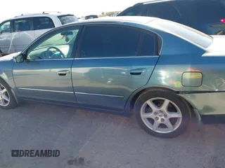 2002 Nissan Altima SE with VIN 1N4BL11D72C700998, listed as a IAAI auction lot 41369017 with 117,148 mi miles. Bid and sale history available at carsss.com. Image 14.