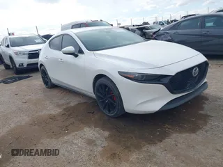 2021 Mazda 3 Premium with VIN JM1BPAML0M1302385, listed as a IAAI auction lot 41397521 with 55,907 mi miles and . Bid and sale history available at DreamBid. Image 1.