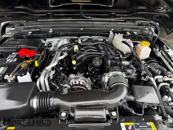 2024 Jeep Gladiator Sport S with VIN 1C6HJTAG2RL132886, listed as a Copart auction lot 63946735 with 6,111 mi miles and Clean title. Bid and sale history available at DreamBid. Image 7.