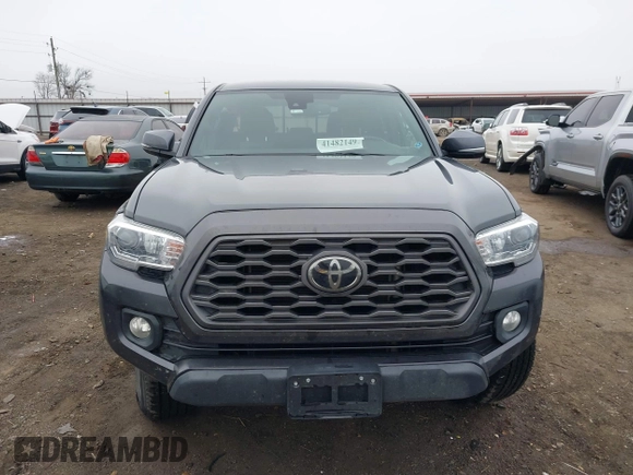 2022 Toyota Tacoma SR with VIN 3TMCZ5AN4NM476170, listed as a IAAI auction lot 41482149 with 57,126 mi miles and . Bid and sale history available at DreamBid. Image 12.