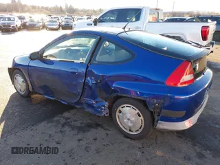 2002 Honda Insight z VIN JHMZE14722T000006, wystawiony jako IAAI lot #41049894 z przebiegiem 185 989 mil mil oraz . Historia ofert i sprzedaży dostępna na DreamBid. Obrazek 3.