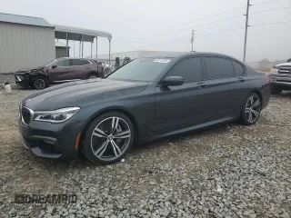 2019 BMW 7 Series 750i with VIN WBA7F0C54KGM25281, listed as a Copart auction lot 84741334 with 76,472 mi miles and Salvage Title. Bid and sale history available at carsss.com. Image 1.