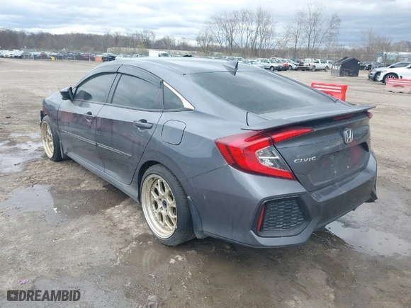 2019 Honda Civic Si Sedan with VIN 2HGFC1E59KH703592, listed as a IAAI auction lot 38735418 with 103,791 mi miles. Bid and sale history available at carsss.com. Image 3.