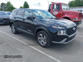 2023 Hyundai Santa Fe SE z VIN 5NMS1DAJ0PH600595, wystawiony jako IAAI lot #42222512 z przebiegiem 16 853 mil mil oraz . Historia ofert i sprzedaży dostępna na DreamBid. Obrazek 1.