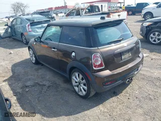 2011 MINI Cooper Hardtop S with VIN WMWSV3C5XBTY14285, listed as a IAAI auction lot 42035836 with 111,479 mi miles. Bid and sale history available at carsss.com. Image 3.