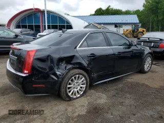 2012 Cadillac CTS Luxury with VIN 1G6DG5E54C0158220, listed as a Copart auction lot 58929735 with 107,667 mi miles and Salvage title. Bid and sale history available at DreamBid. Image 3.