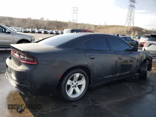 2015 Dodge Charger SE with VIN 2C3CDXBG2FH795792, listed as a Copart auction lot 51297775 with 115,690 mi miles and Salvage Title. Bid and sale history available at DreamBid. Image 3.