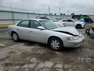 2002 Buick Regal LS with VIN 2G4WB52K321285571, listed as a Copart auction lot 57562465 with 91,352 mi miles and Salvage title. Bid and sale history available at DreamBid. Image 13.