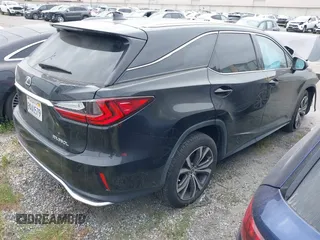 2022 Lexus RX with VIN JTJHZKFA8N2038704, listed as a IAAI auction lot 41892583 with 35,565 mi miles. Bid and sale history available at carsss.com. Image 4.