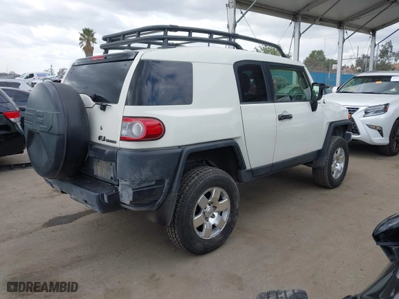 2014 Toyota FJ Cruiser with VIN JTEBU4BF7EK177741, listed as a IAAI auction lot 41871477 with 195,262 mi miles. Bid and sale history available at carsss.com. Image 4.