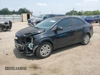 2017 Chevrolet Sonic LS with VIN 1G1JB5SH6H4134023, listed as a Copart auction lot 59265975 with 96,512 mi miles and Salvage title. Bid and sale history available at DreamBid. Image 1.