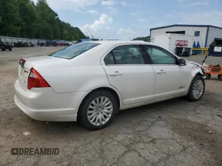 2012 Ford Fusion Hybrid с VIN 3FADP0L35CR184476, выставлен на аукционе Copart как лот 63907885 с пробегом 230 589 миль миль и Списание • Salvage title. История ставок и продаж доступна на DreamBid. Изображение 3.
