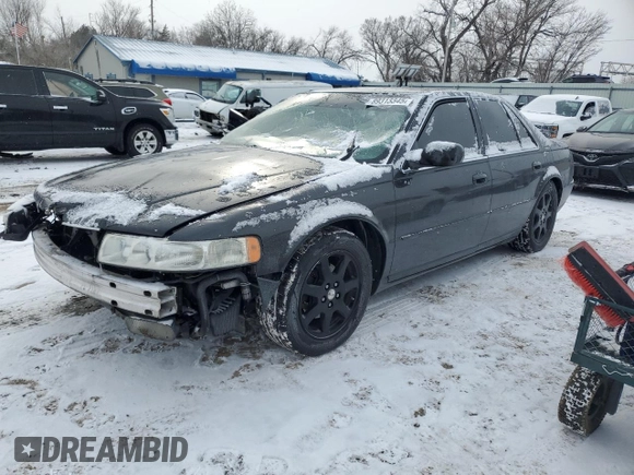 2002 Cadillac Seville Touring STS z VIN 1G6KY549X2U177791, wystawiony jako Copart lot #89313345 z przebiegiem 171 707 mil mil oraz Szkoda całkowita • Salvage title. Historia ofert i sprzedaży dostępna na DreamBid. Obrazek 1.