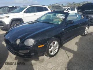 1997 Toyota Celica GT with VIN JT5FG02T1V0043181, listed as a Copart auction lot 76278144 with 101,686 mi miles and Salvage Title. Bid and sale history available at carsss.com. Image 1.
