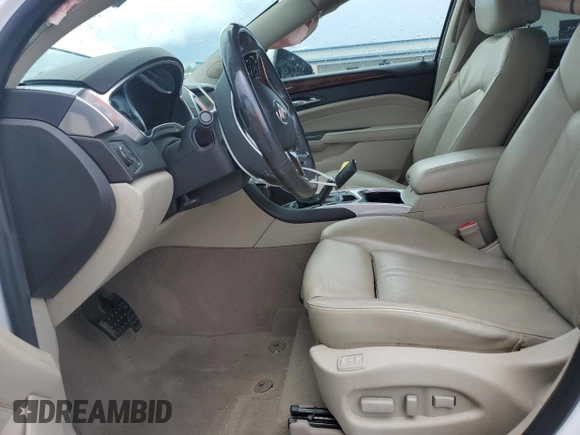 2013 Cadillac SRX Premium Collection with VIN 3GYFNEE32DS644426, listed as a Copart auction lot 59775625 with 106,240 mi miles and Salvage title. Bid and sale history available at DreamBid. Image 7.