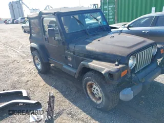 2002 Jeep Wrangler Sahara with VIN 1J4FA59S02P703627, listed as a IAAI auction lot 42815504 with 144,573 mi miles and . Bid and sale history available at DreamBid. Image 1.