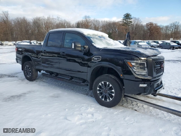 2024 Nissan Titan XD PRO-4X with VIN 1N6AA1FB1RN112626, listed as a Copart auction lot 81987324 with NaN miles and Salvage Title. Bid and sale history available at carsss.com. Image 4.