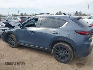 2023 Mazda CX-5 S Carbon Edition z VIN JM3KFBCM6P0288402, wystawiony jako IAAI lot #41682386 z przebiegiem 30 482 mil mil oraz . Historia ofert i sprzedaży dostępna na DreamBid. Obrazek 14.