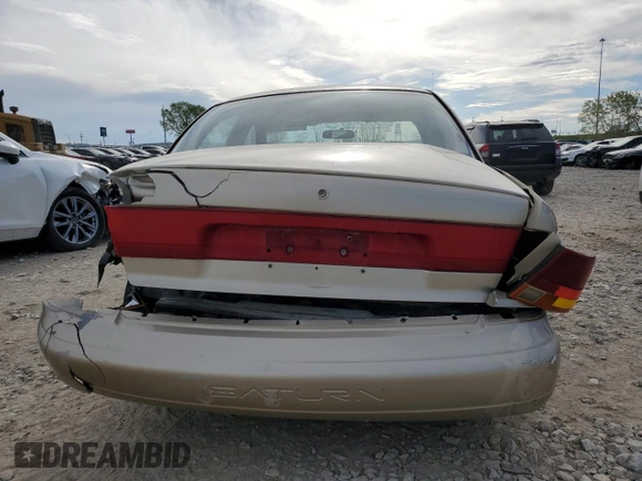 1999 Saturn SL с VIN 1G8ZK5278XZ269792, выставлен на аукционе Copart как лот 48773395 с пробегом 159 506 миль миль и Списание • Salvage title. История ставок и продаж доступна на DreamBid. Изображение 6.