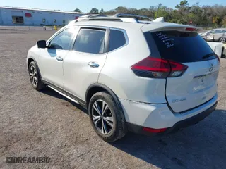 2019 Nissan Rogue SV with VIN JN8AT2MTXKW250958, listed as a IAAI auction lot 41661277 with 68,851 mi miles. Bid and sale history available at carsss.com. Image 3.