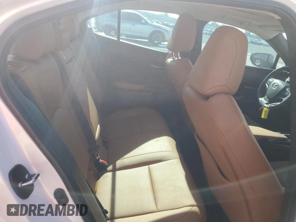 2021 Lexus UX 250h с VIN JTHP9JBH5M2041312, выставлен на аукционе Copart как лот 50294735 с пробегом 7 910 миль миль и Списание • Salvage title. История ставок и продаж доступна на DreamBid. Изображение 10.