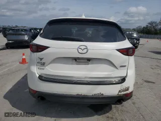 2017 Mazda CX-5 Grand Touring with VIN JM3KFBDL9H0202667, listed as a Copart auction lot 51971035 with 126,668 mi miles and Salvage Title. Bid and sale history available at carsss.com. Image 6.