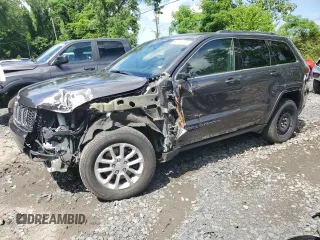 2021 Jeep Grand Cherokee Laredo E with VIN 1C4RJFAG1MC525298, listed as a Copart auction lot 64105765 with 51,867 mi miles and Salvage title. Bid and sale history available at DreamBid. Image 1.