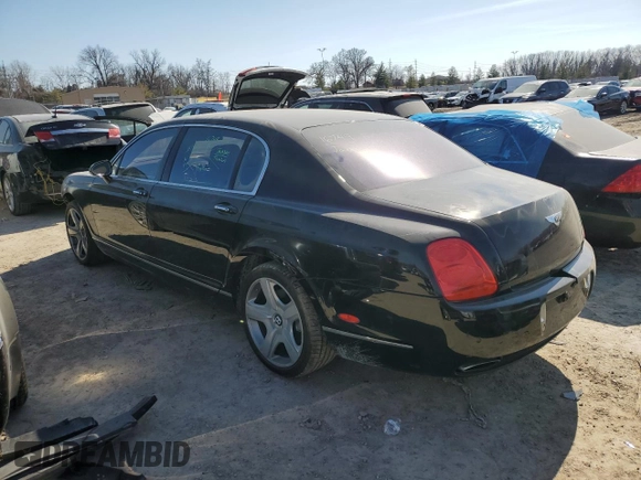 2006 Bentley Flying Spur z VIN SCBBR53W96C032273, wystawiony jako Copart lot #46582715 z przebiegiem Nie podano mil oraz Szkody całkowita. Historia ofert i sprzedaży dostępna na DreamBid. Obrazek 2.
