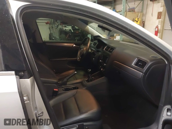 2014 Volkswagen Jetta TDI w/Premium with VIN 3VW3L7AJ6EM379401, listed as a IAAI auction lot 42086326 with 89,870 mi miles and . Bid and sale history available at DreamBid. Image 5.