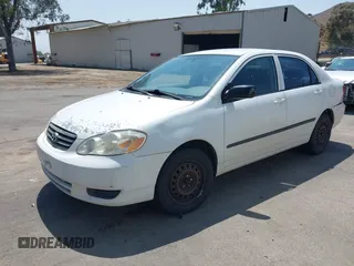 2004 Toyota Corolla CE with VIN 1NXBR32E84Z214365, listed as a IAAI auction lot 42218776 with 248,810 mi miles and . Bid and sale history available at DreamBid. Image 2.