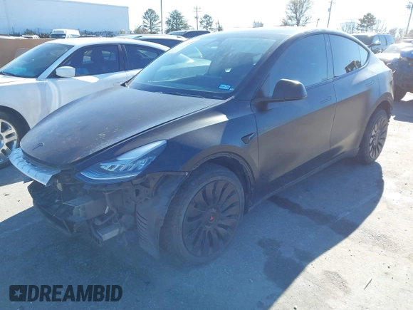 2022 Tesla Model Y Long Range with VIN 7SAYGDEEXNF424856, listed as a IAAI auction lot 41059718 with 44,439 mi miles and . Bid and sale history available at carsss.com. Image 23.