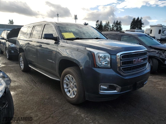 2019 GMC Yukon XL SLT with VIN 1GKS2GKC8KR319183, listed as a Copart auction lot 88273675 with 70,241 mi miles and Salvage Title. Bid and sale history available at carsss.com. Image 4.