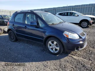 2010 Suzuki SX4 Touring with VIN JS2YB5A71A6310393, listed as a Copart auction lot 77673534 with 65,987 mi miles and Clean Title. Bid and sale history available at carsss.com. Image 4.