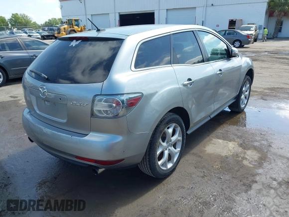 2010 Mazda CX-7 Touring with VIN JM3ER2W31A0348858, listed as a IAAI auction lot 42084790 with 136,261 mi miles. Bid and sale history available at carsss.com. Image 4.