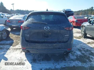 2020 Mazda CX-5 Grand Touring with VIN JM3KFBDM7L1807685, listed as a IAAI auction lot 41392313 with 91,729 mi miles and . Bid and sale history available at carsss.com. Image 16.