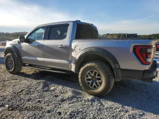 2021 Ford F-150 Raptor with VIN 1FTFW1RG3MFC82314, listed as a Copart auction lot 88801445 with 57,743 mi miles and Salvage Title. Bid and sale history available at carsss.com. Image 2.