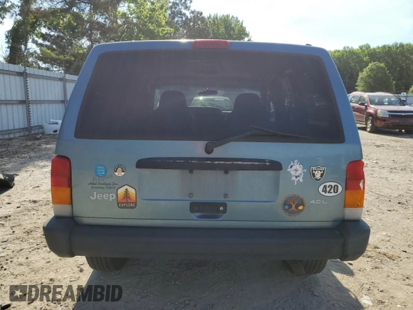1998 Jeep Cherokee Sport with VIN 1J4FJ68S6WL283022, listed as a Copart auction lot 57451125 with 207,618 mi miles and Salvage title. Bid and sale history available at DreamBid. Image 6.