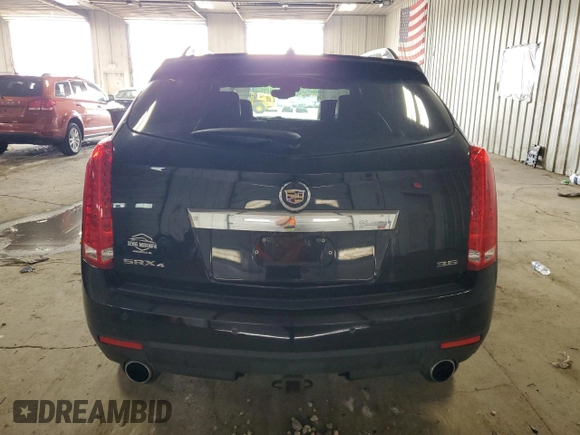 2014 Cadillac SRX Performance Collection with VIN 3GYFNFE34ES583362, listed as a Copart auction lot 61966535 with 145,954 mi miles and Non repairable. Bid and sale history available at DreamBid. Image 6.