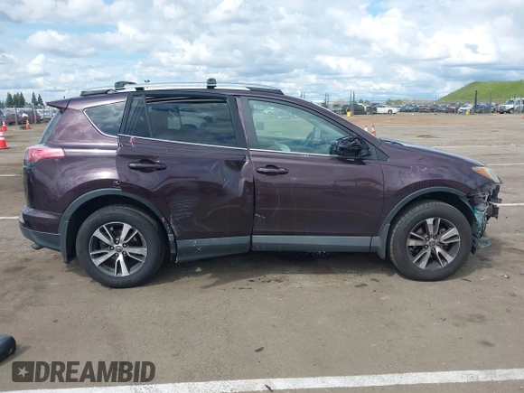 2017 Toyota RAV4 XLE with VIN 2T3WFREV6HW354078, listed as a IAAI auction lot 41922743 with 155,777 mi miles and . Bid and sale history available at DreamBid. Image 14.