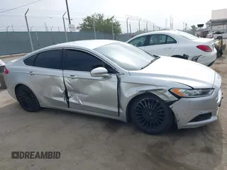 2016 Ford Fusion Titanium z VIN 3FA6P0K92GR135076, wystawiony jako IAAI lot #42604875 z przebiegiem 192 785 mil mil oraz . Historia ofert i sprzedaży dostępna na DreamBid. Obrazek 13.