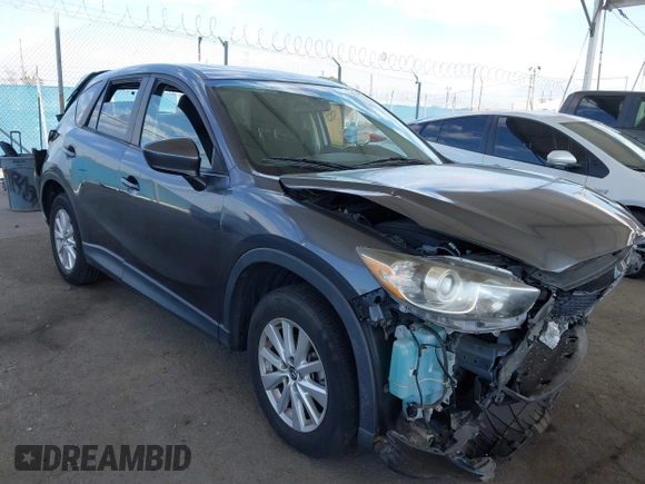 2014 Mazda CX-5 Touring with VIN JM3KE2CY9E0384401, listed as a IAAI auction lot 41699913 with 75,301 mi miles. Bid and sale history available at carsss.com. Image 1.