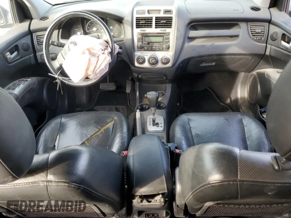 2005 Kia Sportage LX with VIN KNDJF723557124458, listed as a Copart auction lot 87089674 with Not Provided miles and Salvage Title. Bid and sale history available at carsss.com. Image 8.