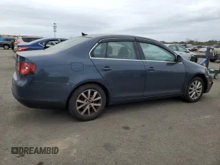 2010 Volkswagen Jetta SE with VIN 3VWRZ7AJ2AM038256, listed as a Copart auction lot 47631015 with 205,579 mi miles and Salvage title. Bid and sale history available at DreamBid. Image 3.