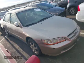 1999 Honda Accord EX z VIN 1HGCG1650XA009854, wystawiony jako IAAI lot #41199973 z przebiegiem Nie podano mil oraz . Historia ofert i sprzedaży dostępna na DreamBid. Obrazek 1.