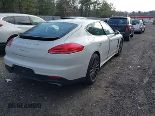 2016 Porsche Panamera 4 z VIN WP0AA2A78GL002029, wystawiony jako IAAI lot #41644555 z przebiegiem 54 915 mil mil oraz . Historia ofert i sprzedaży dostępna na DreamBid. Obrazek 4.
