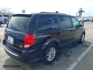 2014 Dodge Grand Caravan SXT 30th Anniversary with VIN 2C4RDGCG7ER122042, listed as a IAAI auction lot 41600892 with 101,596 mi miles. Bid and sale history available at carsss.com. Image 4.