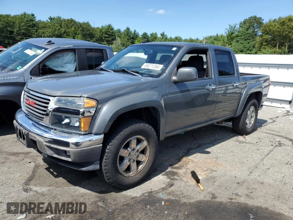 2012 GMC Canyon SLE2 with VIN 1GTH6PFE5C8138412, listed as a Copart auction lot 69271264 with 89,100 mi miles and Salvage Title. Bid and sale history available at carsss.com. Image 1.