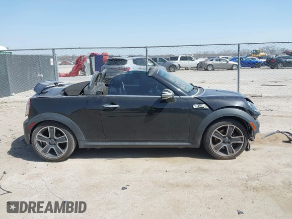 2012 MINI Roadster S with VIN WMWSY3C56CT144520, listed as a IAAI auction lot 41818205 with 86,836 mi miles and . Bid and sale history available at DreamBid. Image 13.